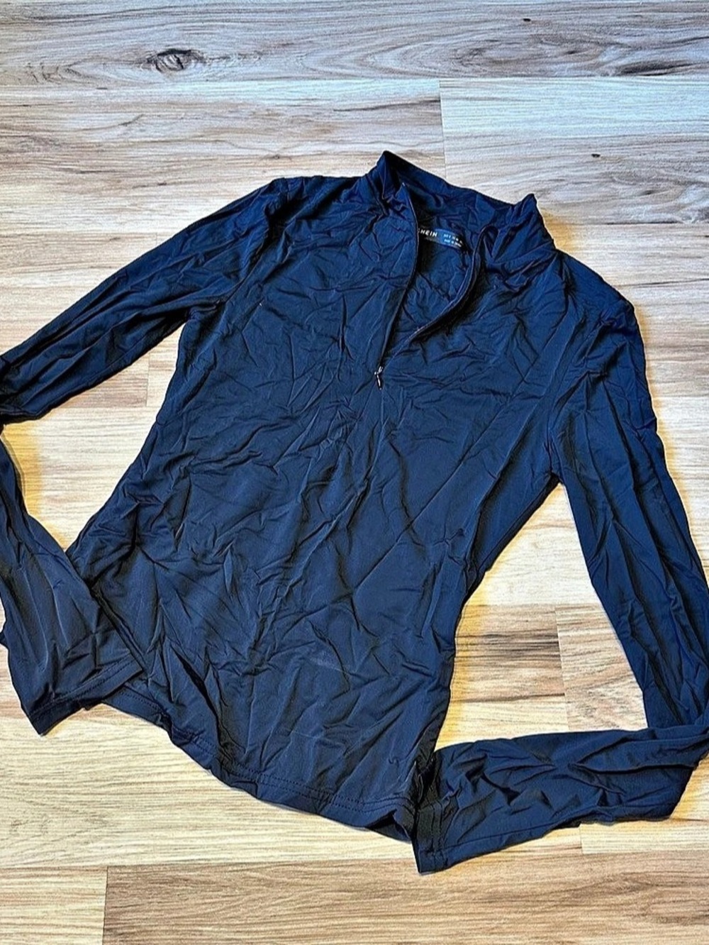 Black quarter zip long sleeve athletic top